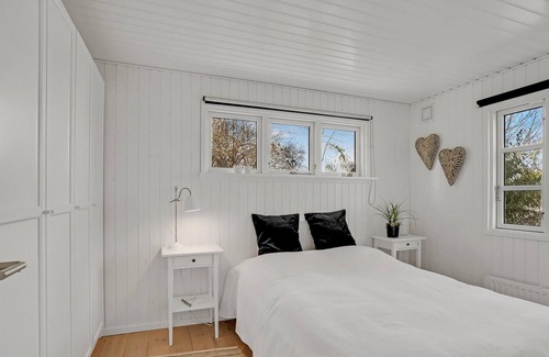 Dronningmolle House | Have a great time near the sea in this vacation home.