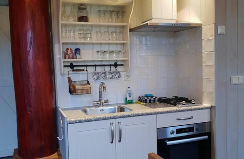 Oudeslius House | Have a unique experience in the Boerderijkamer with private outdoor hot tub , breathtaking views and comfortable amenities. Enjoy a carefree stay with fresh rolls and delicious coffee every day and explore the surrounding area, the beach, Callantsoog