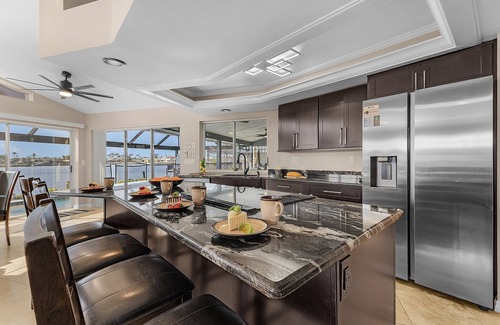 Eight Lakes House | Heated Pool, Beautiful Sunsets, Fishing Dock- Villa Thunderbird View - Roelens Vacations