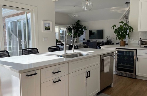 Southold House | Heated pool on Goose Creek, private dock, massive yard walk to beach, wineries