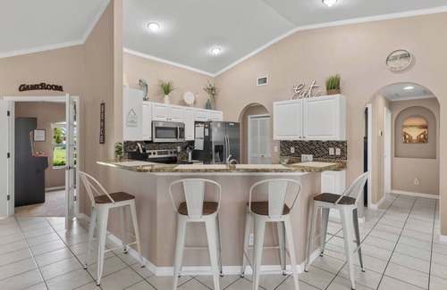Trafalgar House | Heated Pool Plus Game Room on Fresh Water Canal