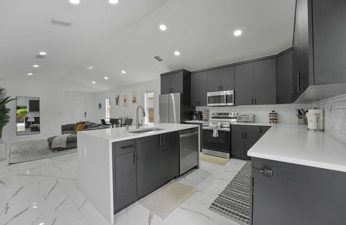 Old Northwood Historic District House | Heated Salt Pool , 4BR Luxe Home , Jacuzzi , Self Check-In