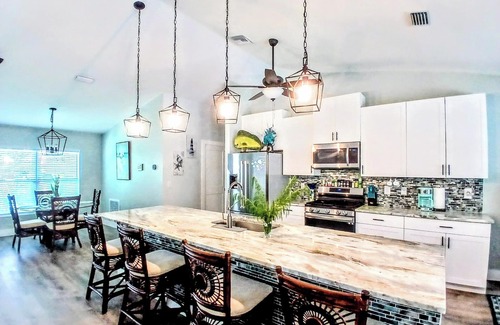 Vero Beach House | Heated Saltwater Pool & Hot Tub Tiki Bar Pet-Friendly Vero Beach Hideaway