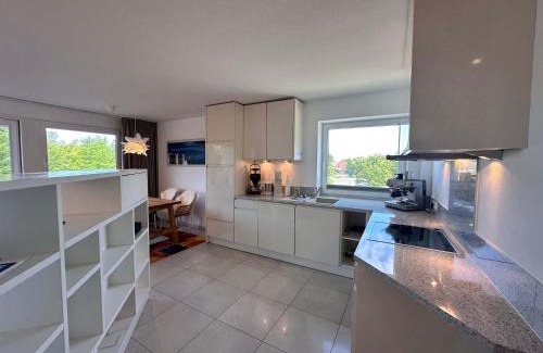 Bad St. Peter-Ording Apartment | Helle Wohnung mit Balkon und Tennisplatz