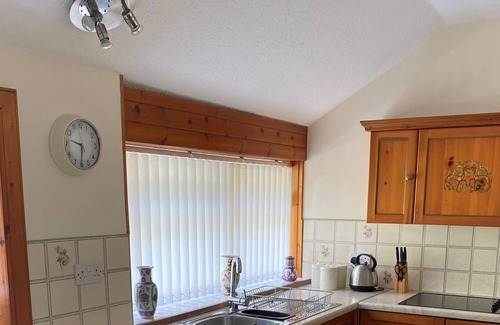 Castle Douglas Cottage | Hensol Lodge - a cottage that sleeps 4 guests in 2 bedrooms
