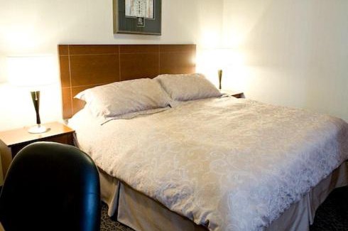 Brooks Hotel | Heritage Inn & Suites - Brooks