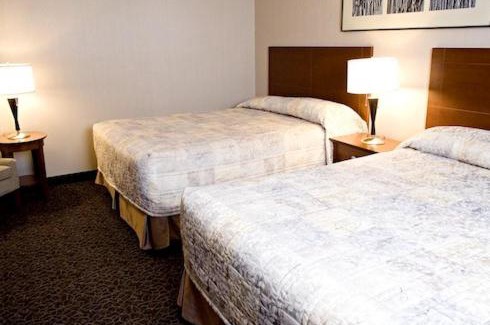 Brooks Hotel | Heritage Inn & Suites - Brooks