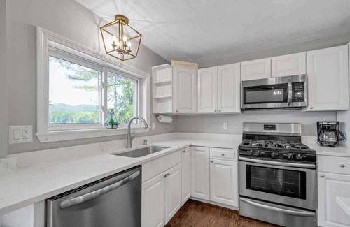 Sanbornton House | Hermit Lake Escape: Family Fun - Beachfront, BBQ!