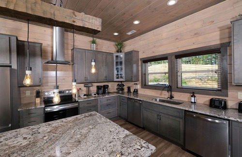 Sevierville Cabin | Hibernation Hideaway - Private indoor pool, theater room, hot tub, games, and more!