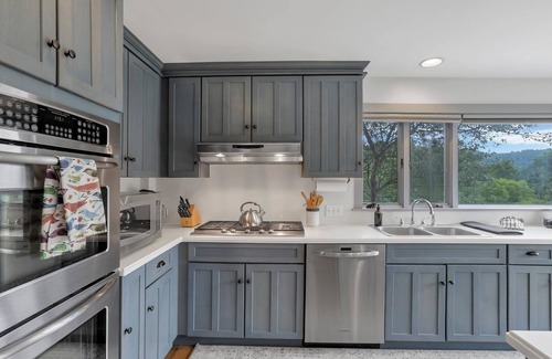 Logan House | Hillside haven on expansive grounds, heated pool, firepit, bocce court and more!