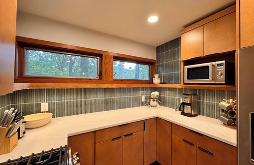 Grand Beach House | Hilltop Hideaway is a mid-century modern home 1 block from Lake Michigan