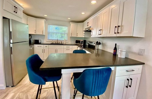 Meredith House | Hilltop Lakeview Retreat - At the Lake & Close to Downtown!