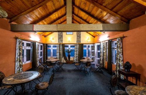 Almora House | Himalayan Paradise, Boutique room w Binsar view by Roamhome