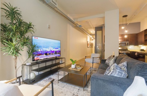 Downtown Pittsburgh Apartment | Historic 2 Bedroom Loft on Market Square - Private Terrace + Free Fitness Center