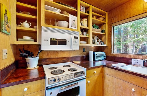 Sea Ranch House | Historic cabin with ocean view, private hot tub, wood stove, & shared pools/tennis