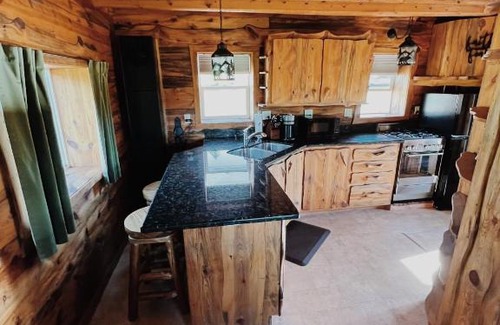 Divide House | Historic cabin with unobstructed mountain view