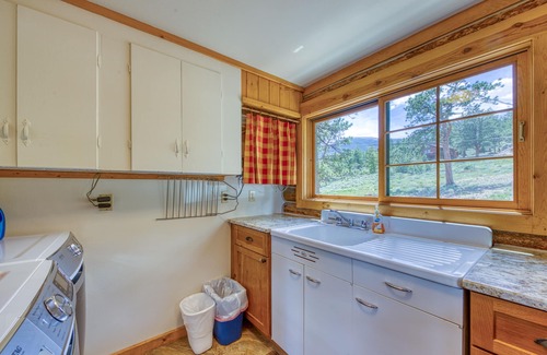 Estes Park Cabin | Historic cabin with mountain views, private W/D, & furnished deck