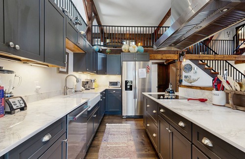 Wells House | Historic charmer with open interior, & large patio - dog-friendly