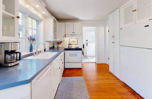 Aquinnah House | Historic, coastal home with water views, screened-in porch, large deck, & grill