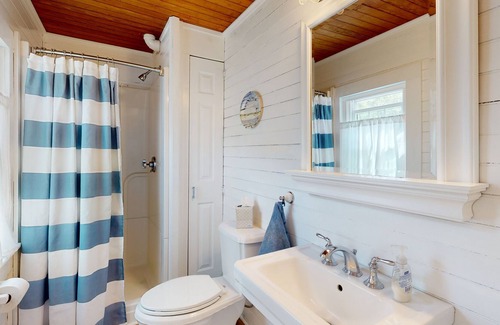 Aquinnah House | Historic, coastal home with water views, screened-in porch, large deck, & grill