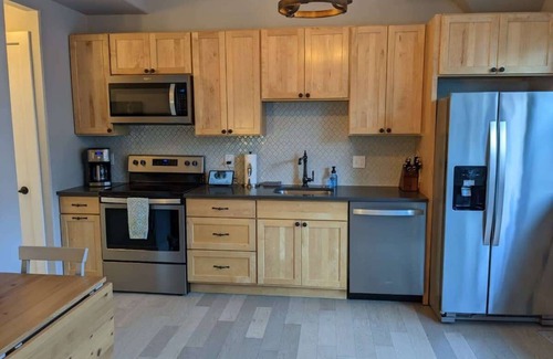 Traverse City Condo | Historic Condo with Views of Old State Hospital!