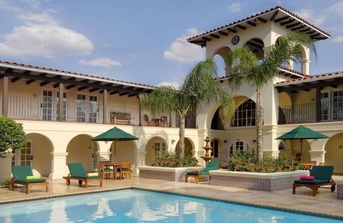 Western Division House | Historic Downtown Getaway | Peaceful Poolside Stay w/Views | 3 Modern Units