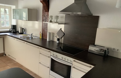 Brookseite Apartment | Historic half-timbered houses combined with modern furnishings in an idyllic location