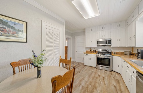 Jasper House | Historic home in downtown Jasper with shaded patio, grill, mountain views & AC