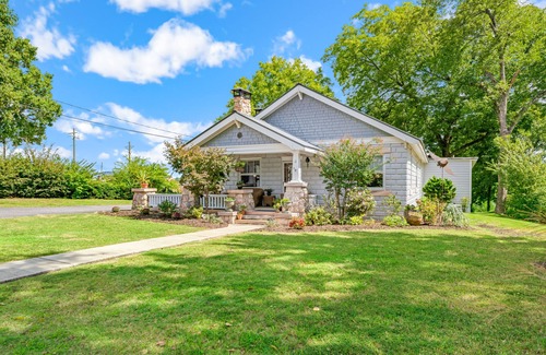 Jasper House | Historic home in downtown Jasper with shaded patio, grill, mountain views & AC