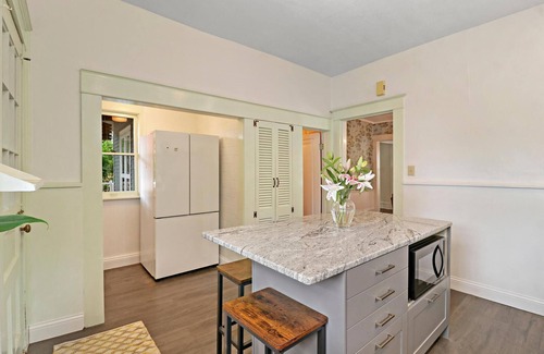 Racine House | Historic house on tree lined red brick street of historic homes.