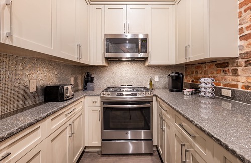 Central Business District Condo | 🧡HISTORIC! - Steps to it ALL! Stay in LUXURY with Your Own Private Terrace🧡| The Audubon