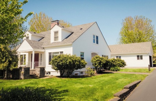 Dayton House | Historic Vineyard Escape, with patio and vintage charm.