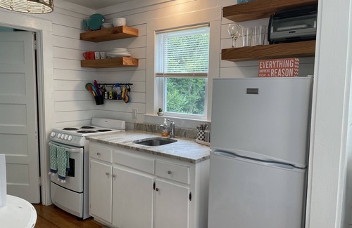 Morehead City Cottage | Historical guest house featured on HGTV's Beachfront Bargain Hunt Renovation!