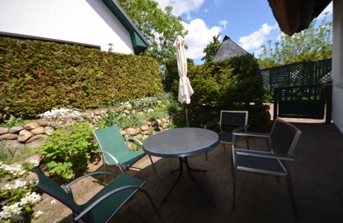 Gross Zicker House | Historical Thatched with a separate entrance with transom windows and shutters