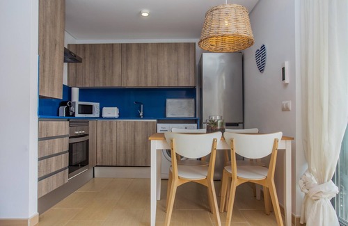 Son Carrio Apartment | Holiday Apartment "Menorca Blue" with Shared Pool, Private Terrace & A/C