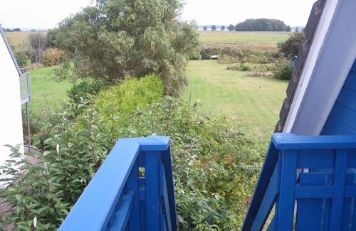 Dandorf Apartment | Holiday apartment with balcony, water view and garden