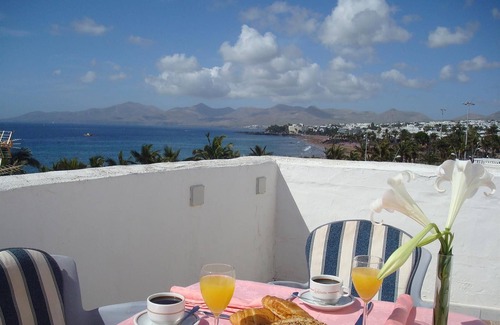 Puerto del Carmen Apartment | Holiday Apartment 'El Quintero' with Sea and Mountain Views, Balcony & Wi-Fi