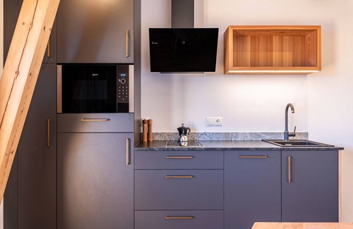 Collalbo Apartment | Holiday Apartment "Aschnerhof Holzherz" with Mountain View, Private Balcony & Wi-Fi