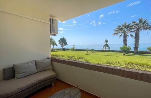 Torrox Costa Apartment | Holiday Apartment 'Casa Del Sol' close to the Beach with Sea View, Shared Garden & Wi-Fi