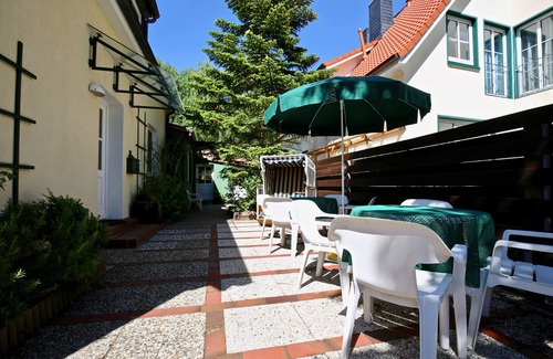 Wangerooge Apartment | Holiday Apartment 'Haus Seemumel, Fewo Unser Boot' with Private Garden and Wi-Fi