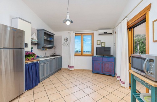San Teodoro Apartment | Holiday Apartment "Lu Impostu" with Sea View, Private Terrace, Pool & Air Conditioning