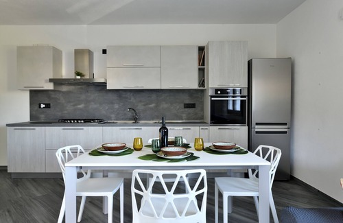 Bari Sardo House | Holiday Apartment LaTorre with Balcony, Terrace and Shared Garden