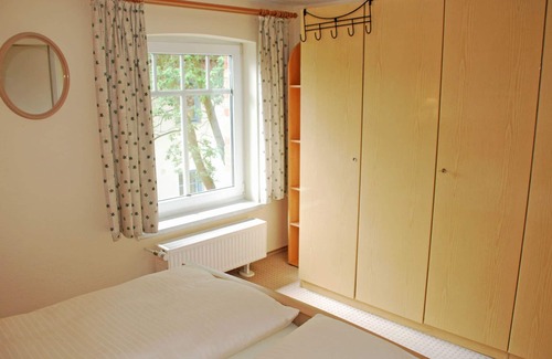 Seedorf Apartment | Holiday apartment Maritim with fireplace - Apartment house to the bridge directly on the lake
