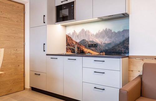 Funes Other | Holiday Apartment "Planerhof Apartment Alpenrose" with Mountain View, Shared Terrace, and Wi-Fi