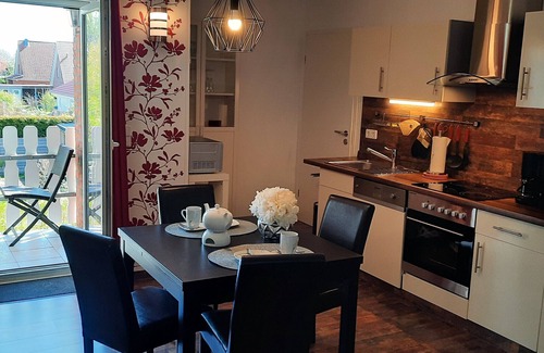 Langballig Apartment | Holiday Apartment "Wikingerland Typ 2 Obergeschoss" with Balcony, Shared Garden & Wi-Fi