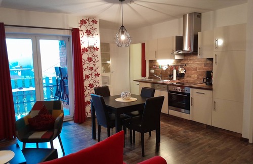 Langballig Apartment | Holiday Apartment "Wikingerland Typ 2 Obergeschoss" with Balcony, Shared Garden & Wi-Fi