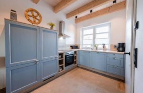 Barssel House | Holiday home "Borkum" with 88sqm - in the holiday park Harkebrügge