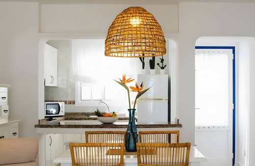 Arrieta House | Holiday Home 'Caleta Campos Bungalows' with Sea View, Shared Pool and Wi-Fi