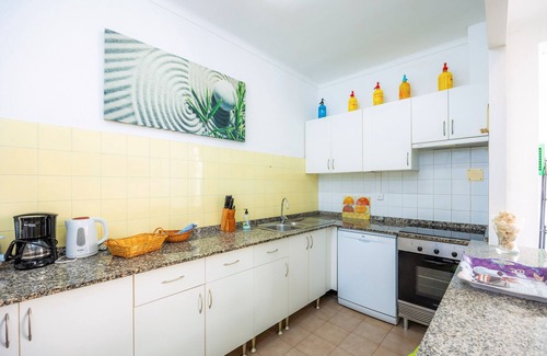 Can Picafort House | Holiday Home 'Casa Tradicional Can Picafort' with Private Garden, Balcony and Wi-Fi