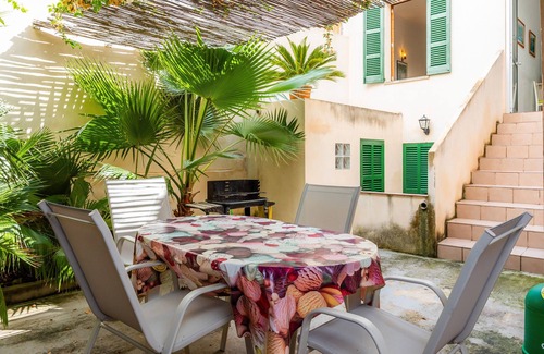 Can Picafort House | Holiday Home 'Casa Tradicional Can Picafort' with Private Garden, Balcony and Wi-Fi